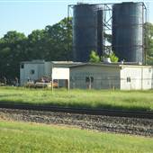 Grain Elevators near Railroad Track