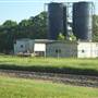 Grain Elevators near Railroad Track